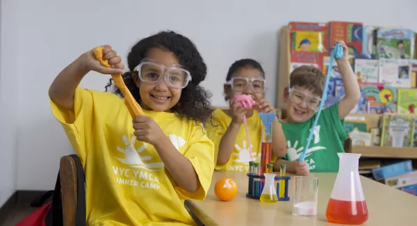 3 kids in a science camp