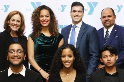 A group of people pose for the camera at the Hispanic Achievers event for the YMCA of Greater New York.