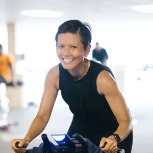 Woman cycling at a YMCA of Greater New York fitness class