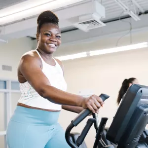 Woman smiling on treadmill