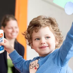 Toddler doing crafts at the YMCA