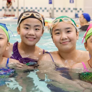 Kid learning how to swim at YMCA