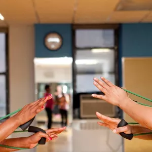 Two women working out together at the Harlem YMCA