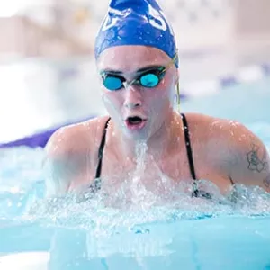 Woman swimming breaststroke