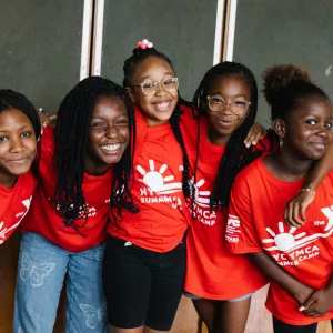 5 girls in a group smile